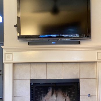 Your AV Guy - Above fireplace - Security Systems Near Me