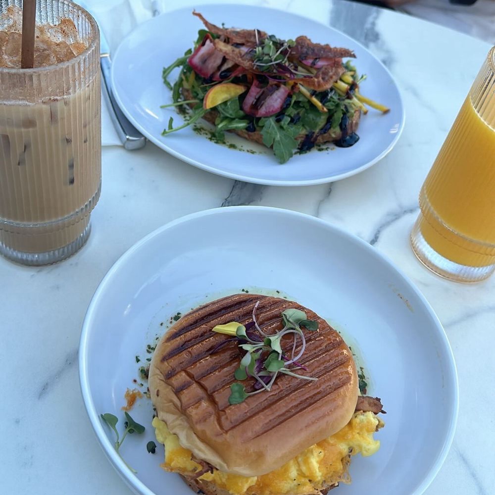 YES PLEASE - Food : Breakfast sandwich on a brioche bun and avocado toast Drinks : iced horchata latte and organic orange juice - Coffee & Tea Near Me - La Quinta, California