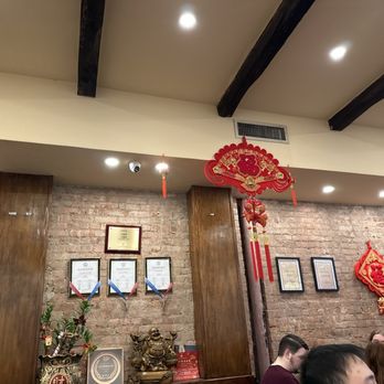 Sky Pavilion - Cny decorations. Wall full of awards (looks like it) - Szechuan Near Me - New York, New York Sky Pavilion - Cny decorations. Wall full of awards (looks like it) - Szechuan Near Me - New York, New York