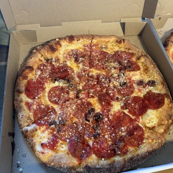 Mojo Pizza - Pepperoni, cheese, Greek olives, parmesan cheese, and hot honey. - Pizza Near Me - Orick, California Mojo Pizza - Pepperoni, cheese, Greek olives, parmesan cheese, and hot honey. - Pizza Near Me - Orick, California