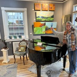 The Smith Gallery & Fine Custom Framing - Debbie in the Drake Gallery, celebrating 36 years in business! Where art and music combine.