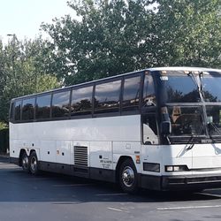 Above All Charters - We provide Prevost Motor Coaches. Our buses are equipped with Restrooms, free wi-fi for your whole group, outlets, dvd and a comfort