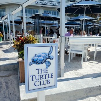 Turtle Club Restaurant - Entrance to the restaurant from the beach tables on sand like the beach. - Seafood Near Me - Naples, Florida Turtle Club Restaurant - Entrance to the restaurant from the beach tables on sand like the beach. - Seafood Near Me - Naples, Florida