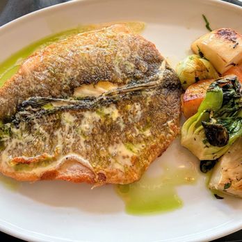 Big Sur Grill - Whole Branzino pan seared drizzled with lemon sauce with a side of Roasted Root Vegetables - American Near Me - Santa Monica, California Big Sur Grill - Whole Branzino pan seared drizzled with lemon sauce with a side of Roasted Root Vegetables - American Near Me - Santa Monica, California
