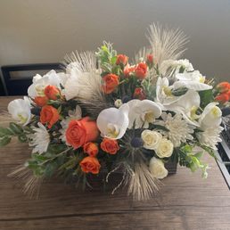 Custom flower arrangement with some dried elements