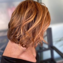 Erika Gold At Salon Studios - Highlights with a copper red gloss.