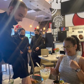 La Perla - Singing Happy Birthday and a sweet dessert flan. - Seafood Near Me - Weston, Florida La Perla - Singing Happy Birthday and a sweet dessert flan. - Seafood Near Me - Weston, Florida