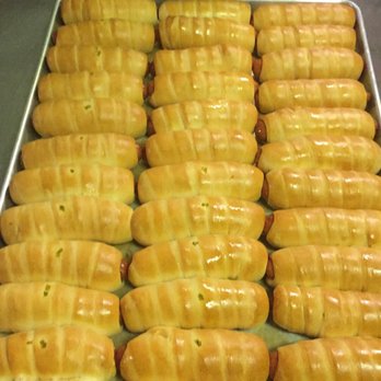 Snowflake Donuts - a tray of hot dogs - Donuts Near Me - Madisonville, Texas