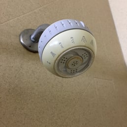This is the shower head that barely works and is obviously past it's time.