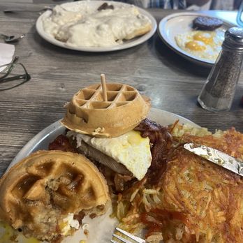 The Rusty Rooster - Biscuits and gravy, side of eggs and sausage and The Mother Clucker. - Breakfast & Brunch Near Me - Lake Ozark, Missouri
