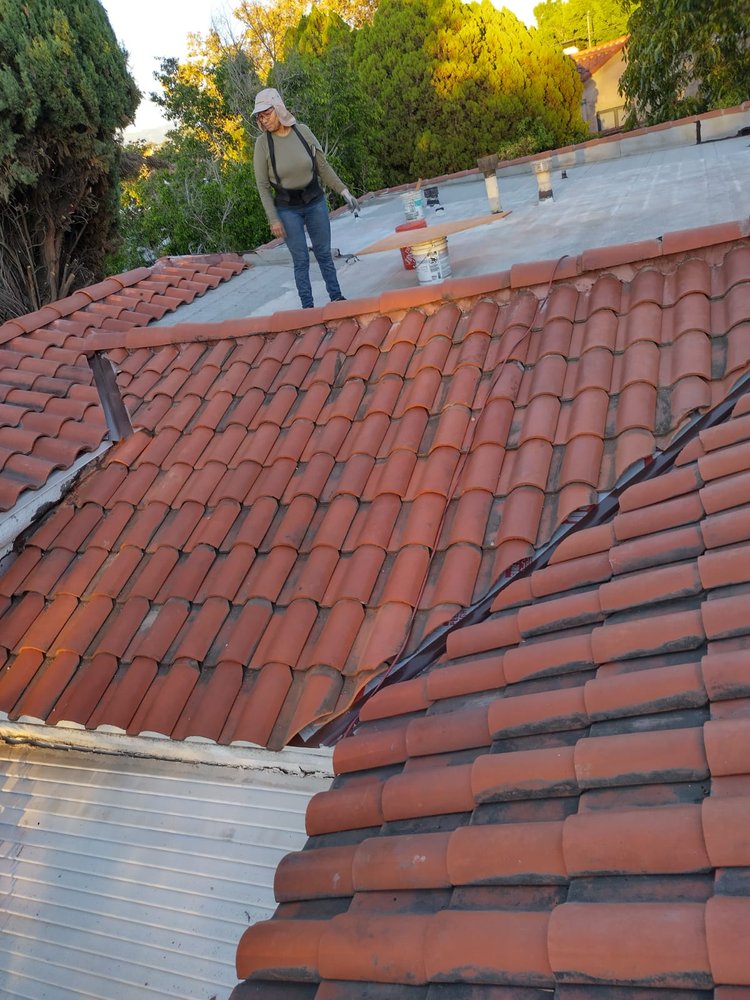 Slide of ADG Roofing & Construction