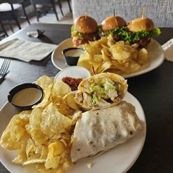 Joe Kool’s of Novi - Grilled Chicken Wrap and Chicken Sliders, both served with chips.
