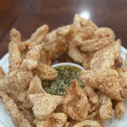 Fresh Chicharrones with our delicious garlic cheese sauce.