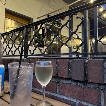 The Sidewalk Café - a glass of wine and a glass of water - American Near Me - Richmond, Virginia The Sidewalk Café - a glass of wine and a glass of water - American Near Me - Richmond, Virginia