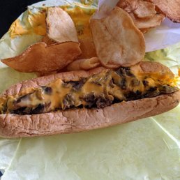 Mushroom cheese steak with cheese whiz and a side of in-house fried chips!