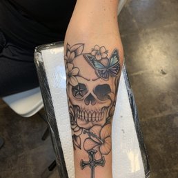 Skulls and flowers done by Kenny at Amity Irons Skulls and flowers done by Kenny at Amity Irons