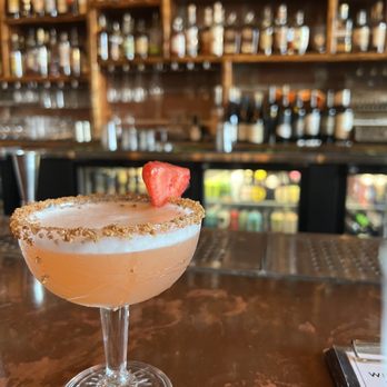 Winchester Public House - a strawberry margarita on a bar - Cocktail Bars Near Me - West Des Moines, Iowa Winchester Public House - a strawberry margarita on a bar - Cocktail Bars Near Me - West Des Moines, Iowa