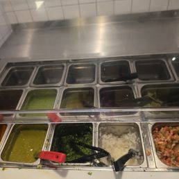 The fixing stations...the green sauces are good!
