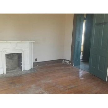 Stacy Arbogast-RE/MAX Central - My Carpenter's Gothic home...before...fireplace in the library... Stacy was right, this house just oozes charm! - Real Estate Agents Near Me - Higginsville, Missouri