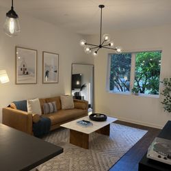 The Handy Dream Team - Light fixture hung as well as framed artwork. Looks great!
