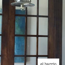 El Barrio Latin Bar & Kitchen - Warm rustic elements combined with contemporary art