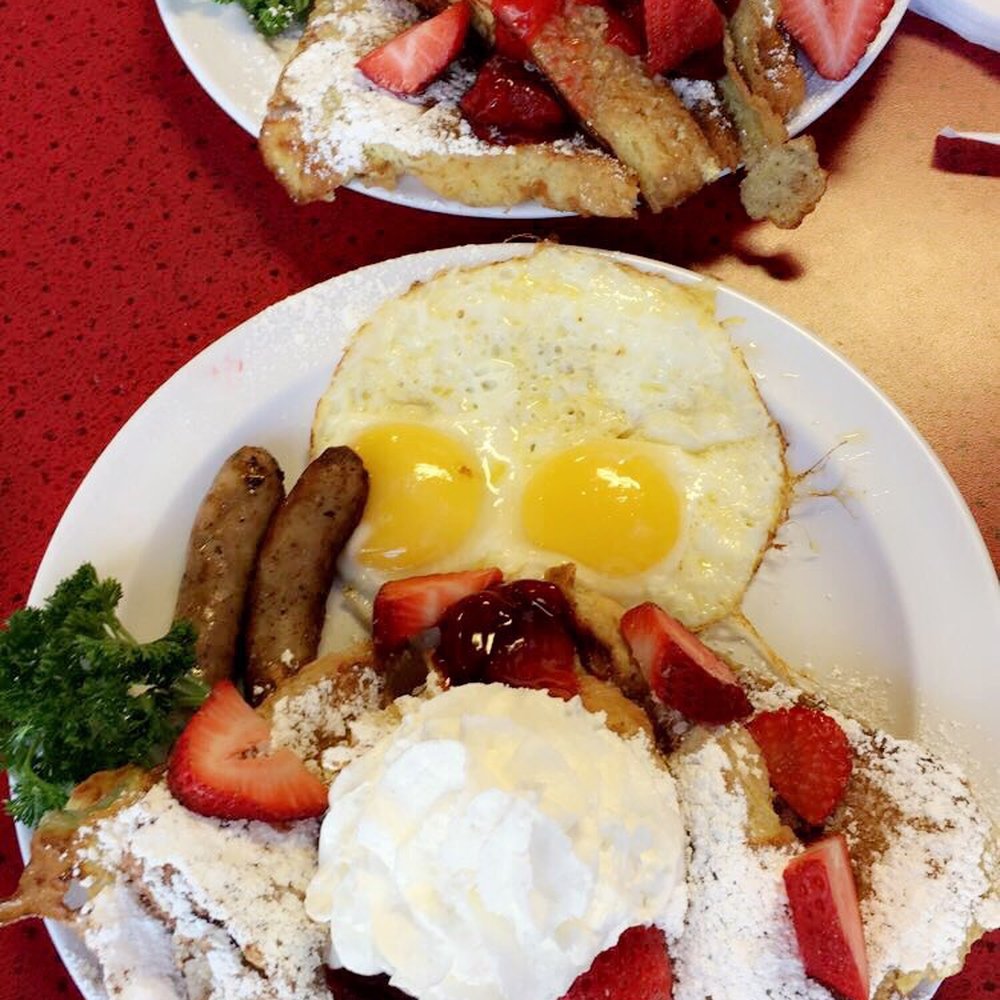 Joes Cafe - Two pieces of French toast (with strawberry fruit topping), two sausages and two eggs. - Breakfast & Brunch Near Me - Orem, Utah Joes Cafe - Two pieces of French toast (with strawberry fruit topping), two sausages and two eggs. - Breakfast & Brunch Near Me - Orem, Utah