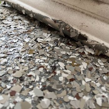 Apollo Concrete Coatings - The bottom of the column was supposed to be lifted and when the chips dried, we would put them down.  They sealed them to the porch... - General Contractors Near Me - Orchard Park, New York