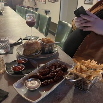 Dolly's - Kbbq wings, truffle fries, Yard Bird Chicken Sandwich - Cocktail Bars Near Me - New York, New York Dolly's - Kbbq wings, truffle fries, Yard Bird Chicken Sandwich - Cocktail Bars Near Me - New York, New York