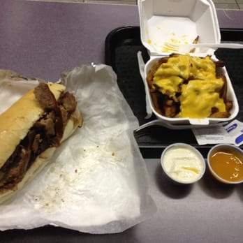 Chaps Pit Beef - Daily special, it beef, corned beef, turkey and Italian sausage with a side of french fries with cheese. - Barbeque Near Me - Baltimore, Maryland