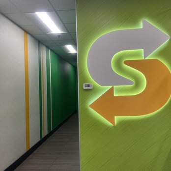 Subway - a hallway with a green and yellow sign - Sandwiches Near Me - Gaithersburg, Maryland Subway - a hallway with a green and yellow sign - Sandwiches Near Me - Gaithersburg, Maryland
