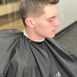Major League Barber Shop - Number 1 fade with tapered sideburns.