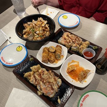 Happy Sushi Yester Oaks location - 1 Piece Egg  Auburn Roll (8 pieces)  Volcano Roll (8 pieces)  3 Piece Gyoza  Grilled chicken fried rice - Sushi Bars Near Me - Mobile, Alabama