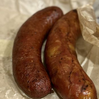 Owens & Hull - Black pepper and garlic sausage (L) and Austrian smoked sausage with Emmental cheese (R) - Barbeque Near Me - Mableton, Georgia Owens & Hull - Black pepper and garlic sausage (L) and Austrian smoked sausage with Emmental cheese (R) - Barbeque Near Me - Mableton, Georgia