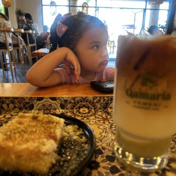 Qamaria Yemeni Coffee - Coconut cake and pistachio iced latte - Coffee & Tea Near Me - Riverside, California
