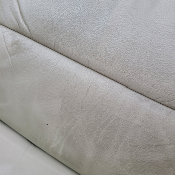 Washpodd - Drip marks showing the damage from the service that day. The leather became stained and rippled and burned - Auto Detailing Near Me - Lynnwood, Washington Washpodd - Drip marks showing the damage from the service that day. The leather became stained and rippled and burned - Auto Detailing Near Me - Lynnwood, Washington
