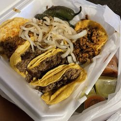 Taqueria El Jimador - The Tacos. The meat was bit burnt. So I didn't receive full tacos on 3 of them.