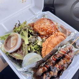 1. Island Style Skewers that come with your choice of 2 empanadas and side salad.