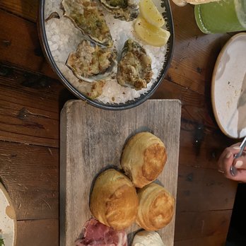 Manuela - Barbecued oysters & cream biscuits with steen's butter & aged country ham - New American Near Me - Los Angeles, California Manuela - Barbecued oysters & cream biscuits with steen's butter & aged country ham - New American Near Me - Los Angeles, California