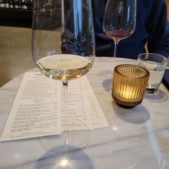 Viaggio Wine Merchant - a glass of wine and a menu - Wine Bars Near Me - Bend, Oregon Viaggio Wine Merchant - a glass of wine and a menu - Wine Bars Near Me - Bend, Oregon