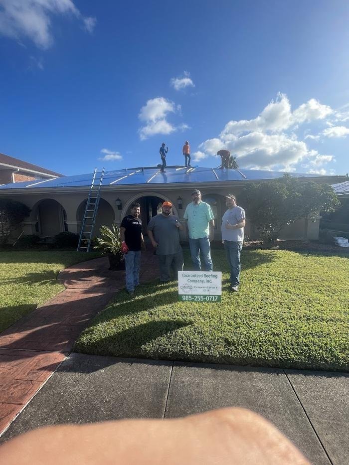 Slide of Guaranteed Roofing Company