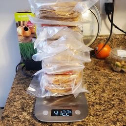 a stack of tortillas on a scale a stack of tortillas on a scale