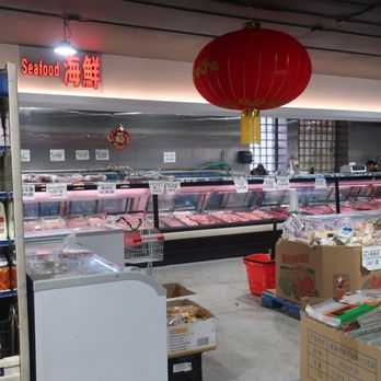 Sun Wing Supermarket - a display of meat and vegetables - Fruits & Veggies Near Me - Chicago, Illinois