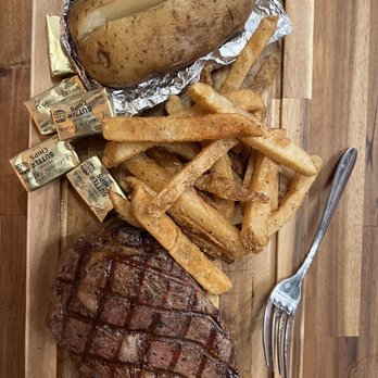 Chop Shop Market & Table - Ribeye with fries and baked potato - Butcher Near Me - Bloomington, Indiana Chop Shop Market & Table - Ribeye with fries and baked potato - Butcher Near Me - Bloomington, Indiana
