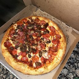 All the toppings on one side of the pizza All the toppings on one side of the pizza