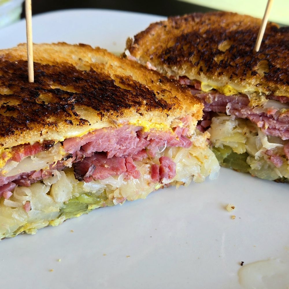 Meester Zebra - NEW Pastrami Sandwich. House-made pastrami, Swiss cheese, sauerkraut, pickle chips, spicy mustard on grilled rye bread. Only fabulous. - American Near Me - Cathedral City, California Meester Zebra - NEW Pastrami Sandwich. House-made pastrami, Swiss cheese, sauerkraut, pickle chips, spicy mustard on grilled rye bread. Only fabulous. - American Near Me - Cathedral City, California