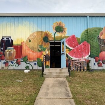 Ruston Farmer's Market - a painted mural on the side of a building - Farmers Market Near Me - Ruston, Louisiana