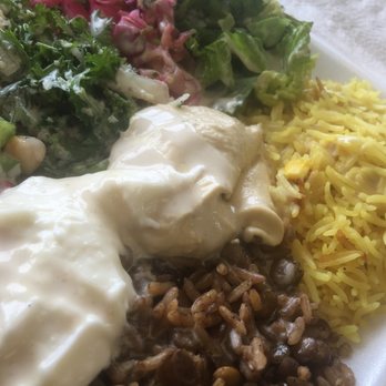 Ali Baba's - a plate of food with rice, beans, and greens - Middle Eastern Near Me - Toronto, Ontario Ali Baba's - a plate of food with rice, beans, and greens - Middle Eastern Near Me - Toronto, Ontario