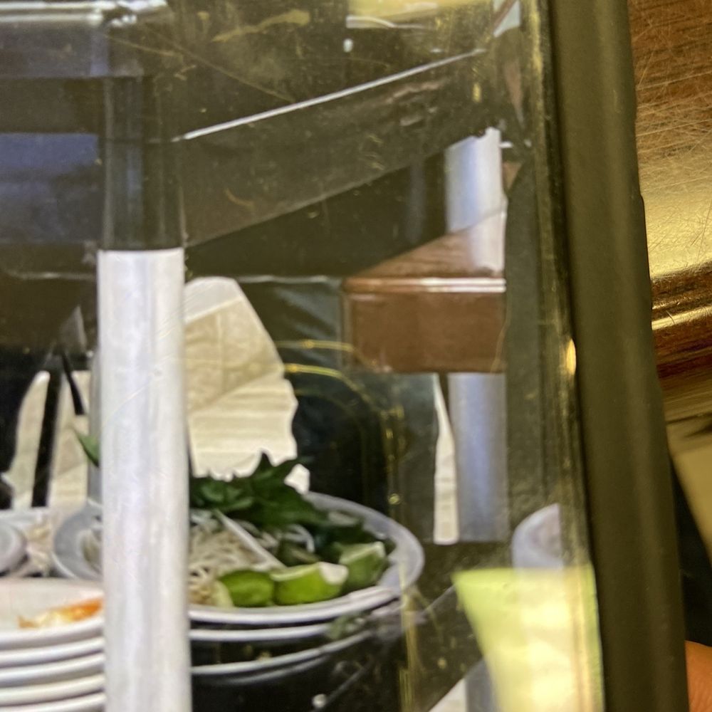 Pho Hieu - Trash scraped off the plates into the black bin on top; basil and bean sprouts stacked and saved below on the shelf. Gross!!! - Vietnamese Near Me - Yukon, Oklahoma