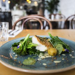 L'Entrepot - Pan roasted cod, spring greens, confit new potatoes, crispy quinoa, lemon chive sauce