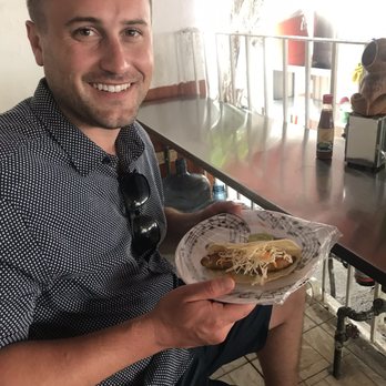 Vallarta Eats - Sean, enjoy his fish taco! His favorite of the tour - Food Tours Near Me - Puerto Vallarta, JAL